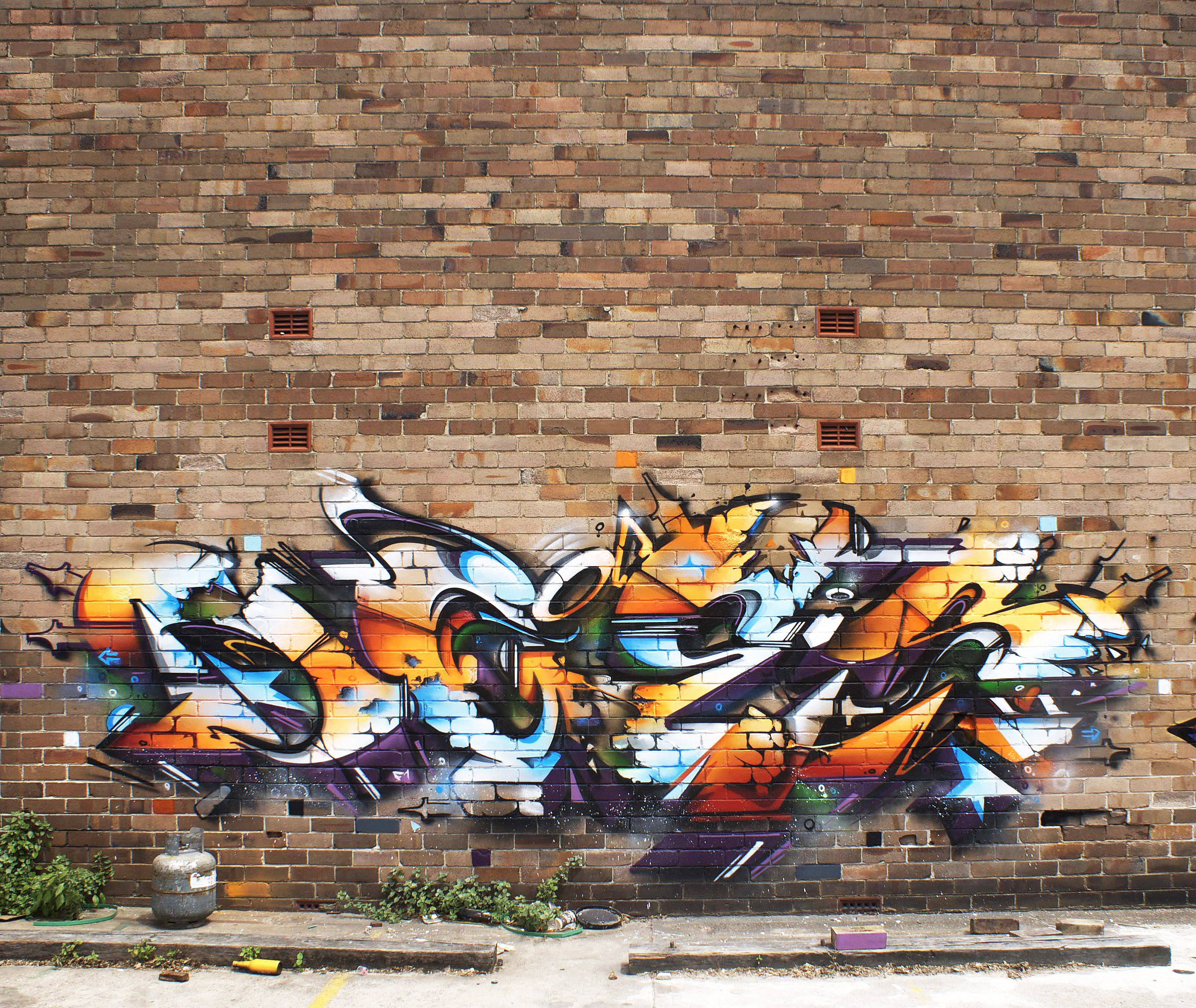 A work by Does - Sydney australia mural bricks