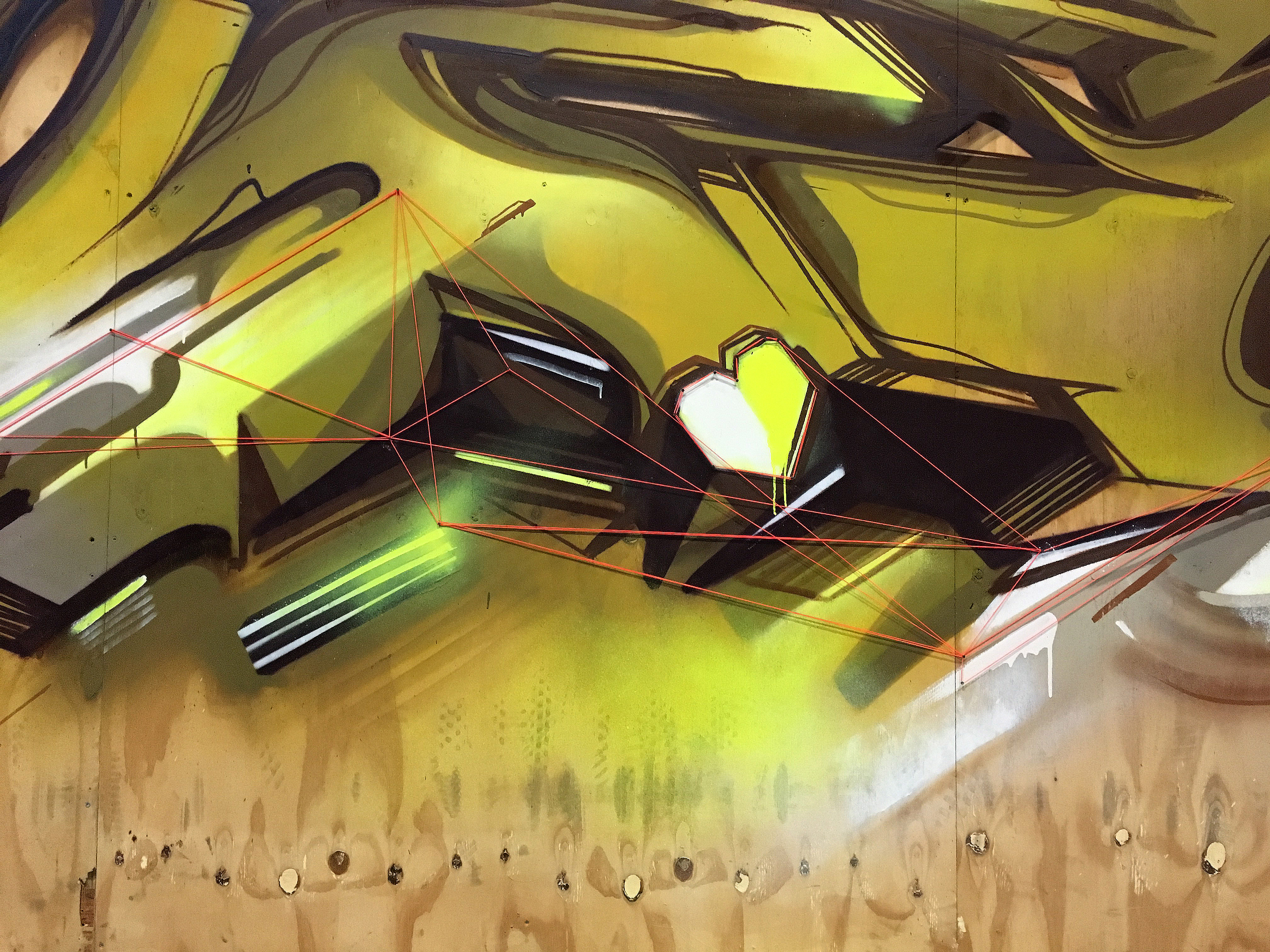 A work by Does - Detail mural wood 15 sittard the netherlands yellow 2